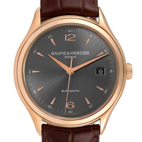This image shows a front view of a Baume & Mercier Clifton M0A10059 Men's Rose Gold Grey Dial M0A10059 Men's Rose Gold Grey Dial watch with a brown leather strap and gold casing.