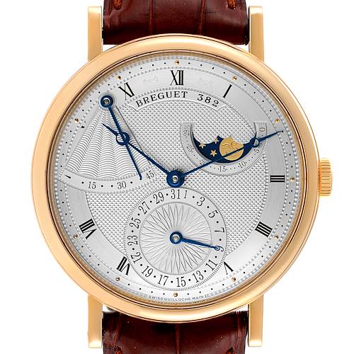 The image shows a front view of the Breguet Classique 7137BA/11/9V6 Men's Yellow Gold Silver Dial 7137BA/11/9V6 Men's Yellow Gold Silver Dial watch, displaying its dial, hands, moon phase, and leather strap.