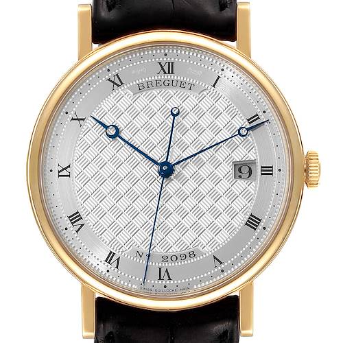 This image shows a Breguet Classique 5177BA/12/9V6 Men's Yellow Gold Silver Dial 5177BA/12/9V6 Men's Yellow Gold Silver Dial model watch from a straight-on view, highlighting the dial, hands, date display, and part of the strap.