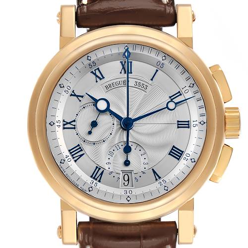 The Breguet Marine 5827BA/12/9Z8 Men's Yellow Gold Silver Dial 5827BA/12/9Z8 Men's Yellow Gold Silver Dial watch is shown from a front angle, highlighting the dial, hands, and leather strap.
