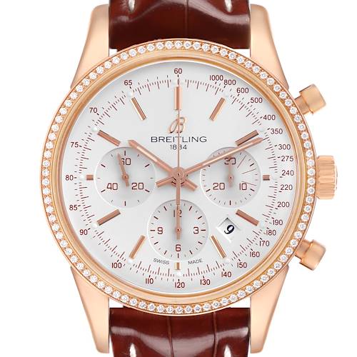 The Breitling Transocean RB0152 Men's Rose Gold Silver Dial watch is shown from the front, displaying its dial, bezel, subdials, and strap.