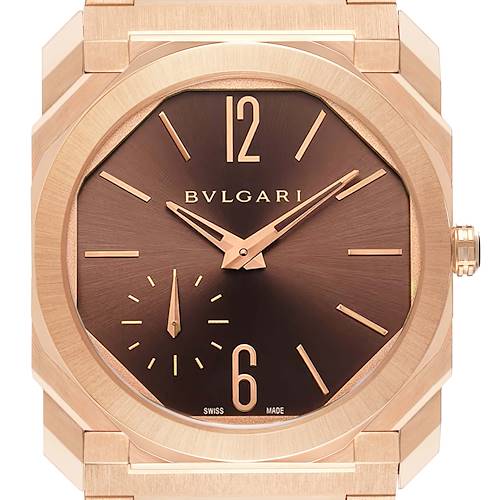 The image shows a close-up view of the Bvlgari Octo 103637 Men's Rose Gold Brown Dial 103637 Men's Rose Gold Brown Dial watch, focusing on the dial, hands, and part of the casing.