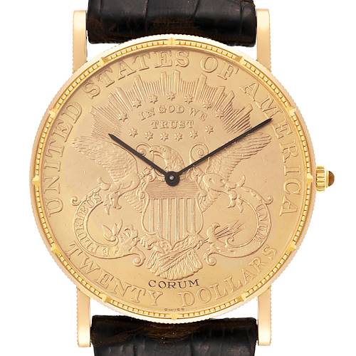 The Corum Coin Watch 1904 Men's Yellow Gold Champagne Dial 1904 Men's Yellow Gold Champagne Dial is shown in a front view, displaying its coin-style dial and black strap.