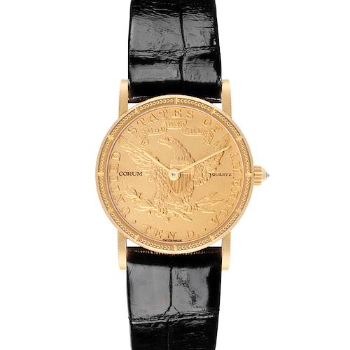 The Corum 5014856 V41 Women's Yellow Gold Champagne Dial 5014856 V41 Women's Yellow Gold Champagne Dial Coin 10 Dollars Double Eagle Yellow Gold Ladies Watch 1892 model is shown from a front angle, highlighting its gold coin face and black strap.