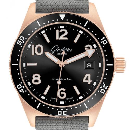 The Glashütte Original watch is shown from a front angle, highlighting the dial, bezel, and crown.