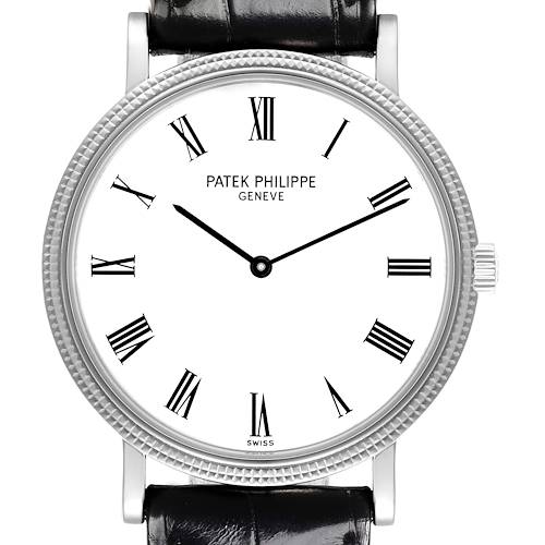 The image shows a Patek Philippe Calatrava 5120G-001 Men's White Gold White Dial 5120G-001 Men's White Gold White Dial watch from the front, highlighting the dial, Roman numerals, and part of the leather strap.