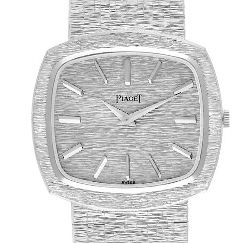 The Piaget 9431A6 Women's White Gold Silver Dial 9431A6 watch is shown from a top view, featuring its white gold stepped bezel and textured dial clearly.