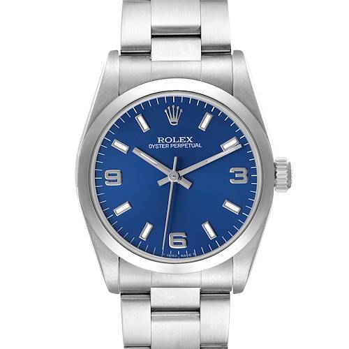 The Rolex Mid-Size 67480 Women's Stainless Steel Blue Dial Oyster Perpetual watch is shown from a front angle, displaying its blue dial, hands, markers, and bracelet.