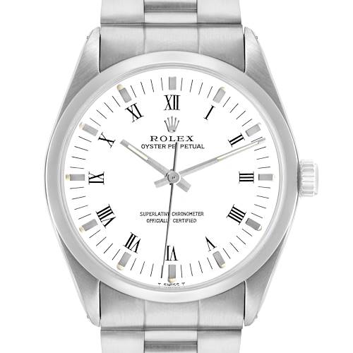 The Rolex Oyster Perpetual 1002 Men's Stainless Steel White Dial watch is shown from a straight-on angle, highlighting the face, bezel, crown, and part of the bracelet.