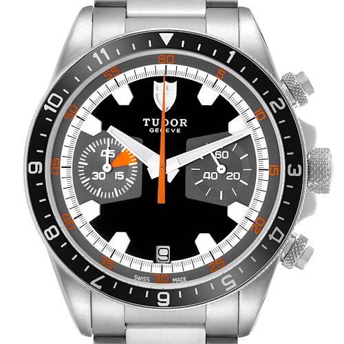 The image shows a front view of the Tudor Heritage Chrono model 70330N-65740, highlighting the watch face, bezel, pushers, and part of the metal bracelet.