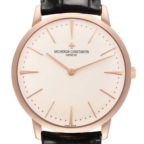 The Vacheron Constantin Patrimony 81180/000R-9159 Men's Rose Gold Silver Dial watch is shown in a frontal angle, highlighting its round dial, rose gold case, and black leather strap.