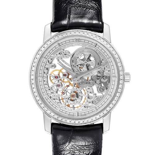 The Vacheron Constantin Traditionnelle 33558/000G-9394 Women's White Gold Silver Dial 33558/000G-9394 Women's White Gold Silver Dial watch is shown from a top-down angle, featuring a skeleton dial and black leather strap.